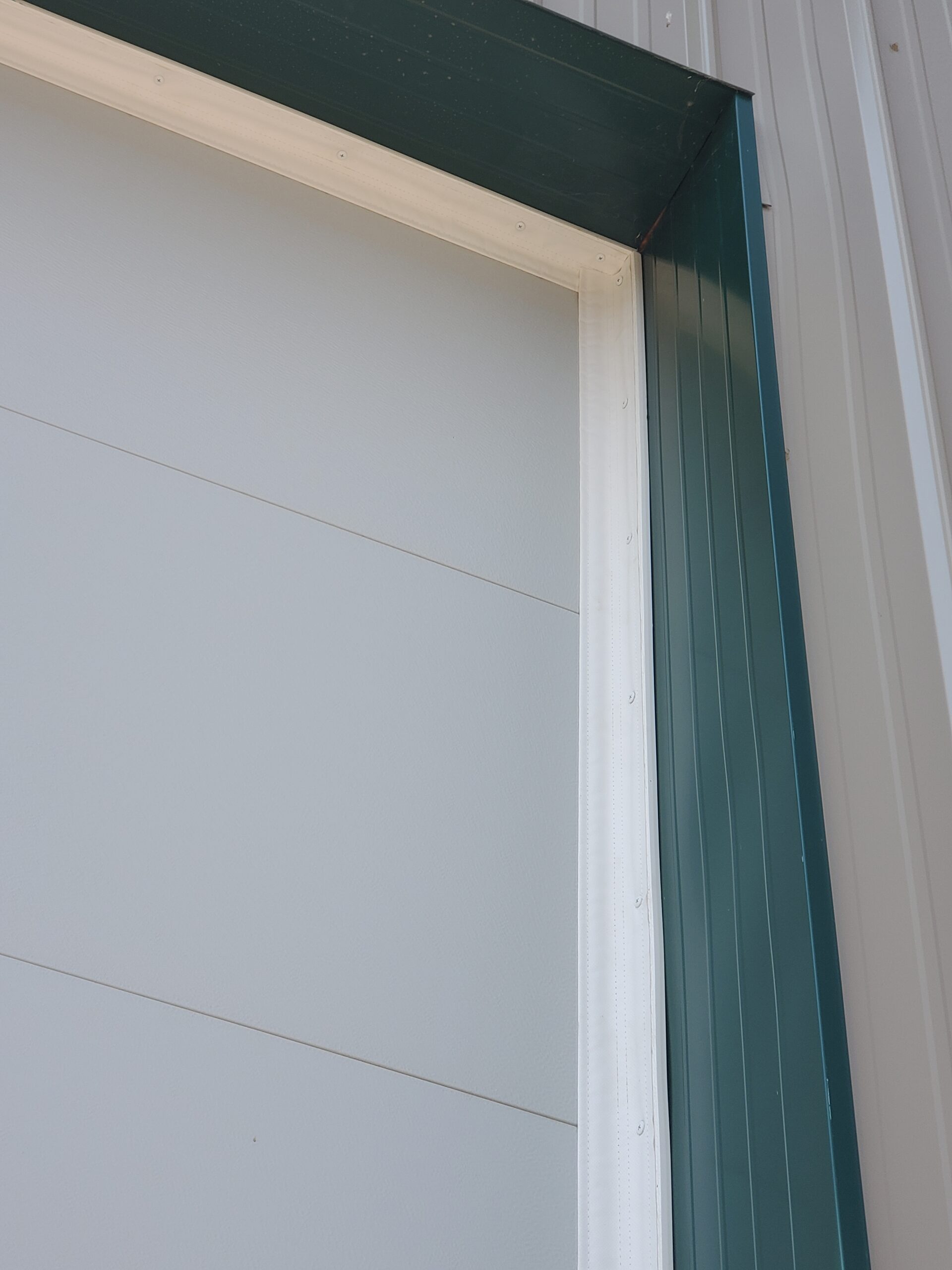 SnirtStopper SideSealer white garage door seal installed 01