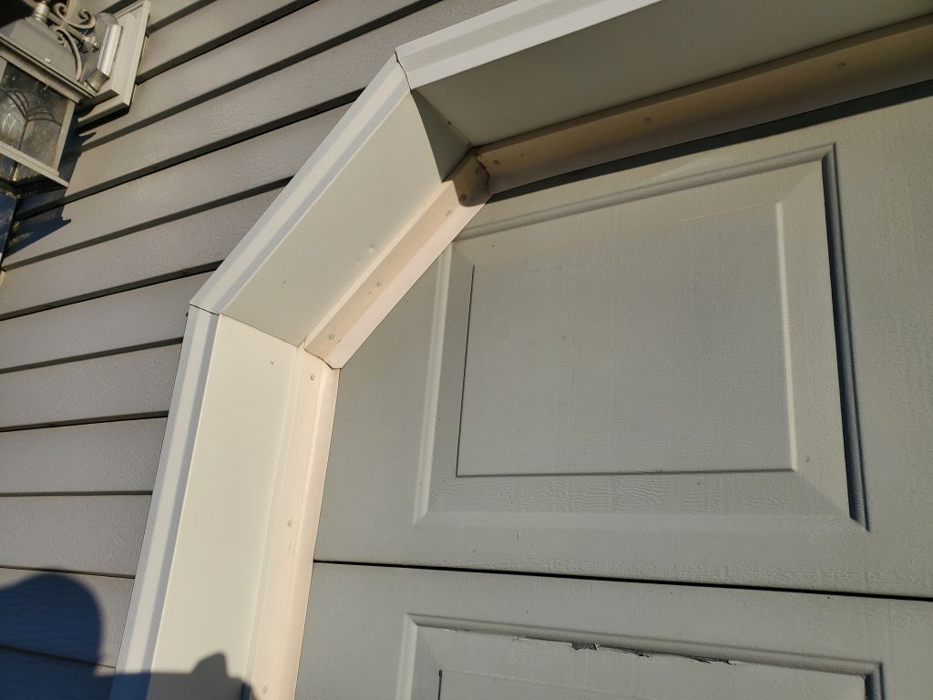 Garage door shown before Side/TopSealer installation