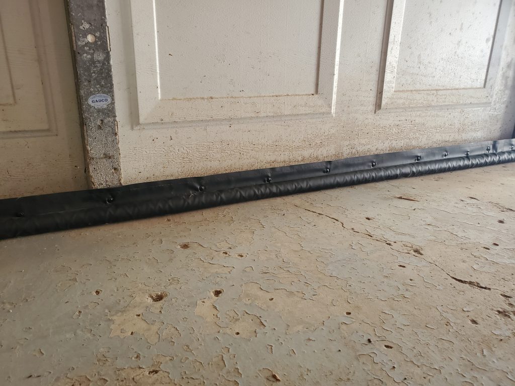 Garage door shown after BottomSealer installed