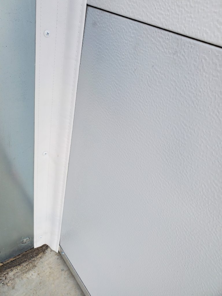 Garage door shown after Side/TopSealer installation