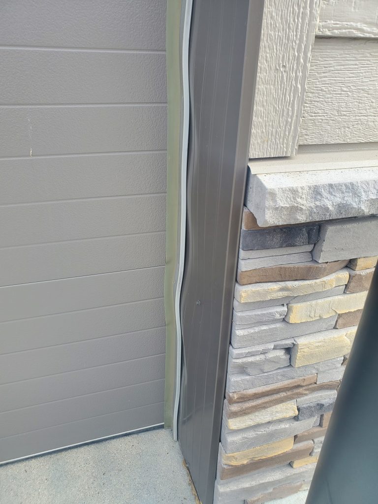 Garage door shown before Side/TopSealer installed