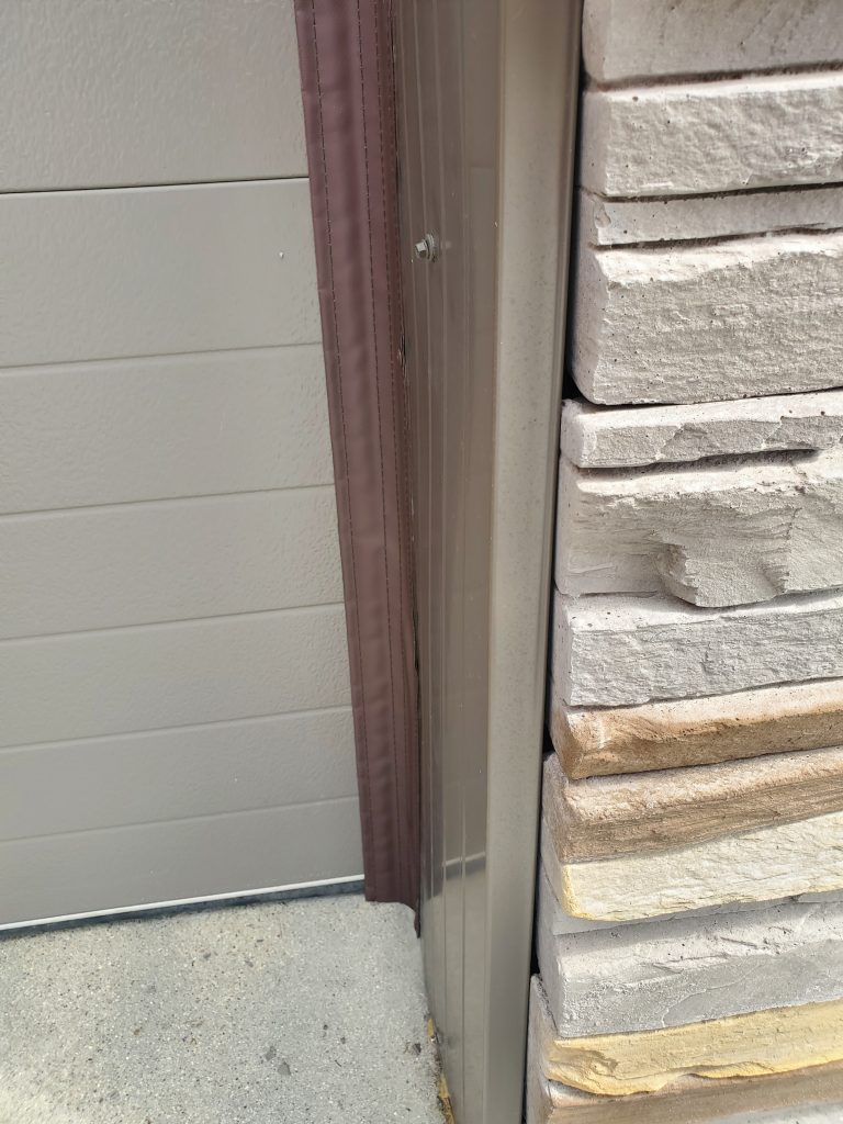 Garage door shown after Side/TopSealer installation