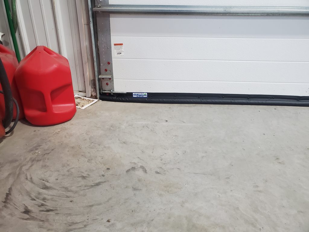 Garage door shown after BottomSealer installed