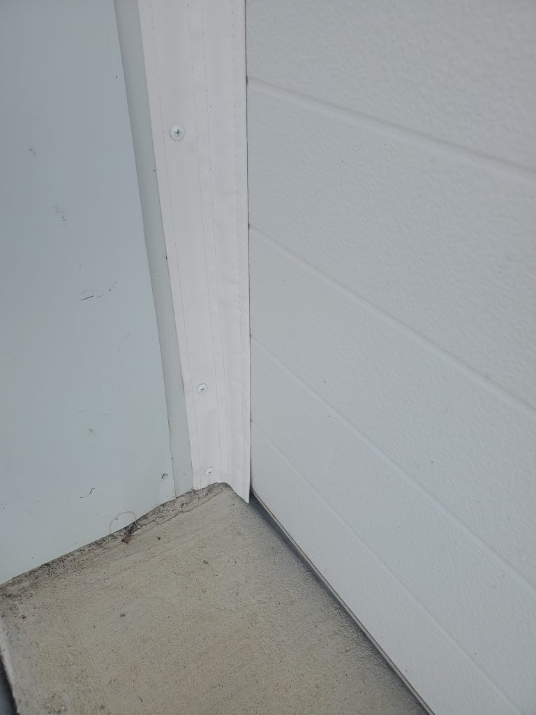 Garage door shown after Side/TopSealer installation