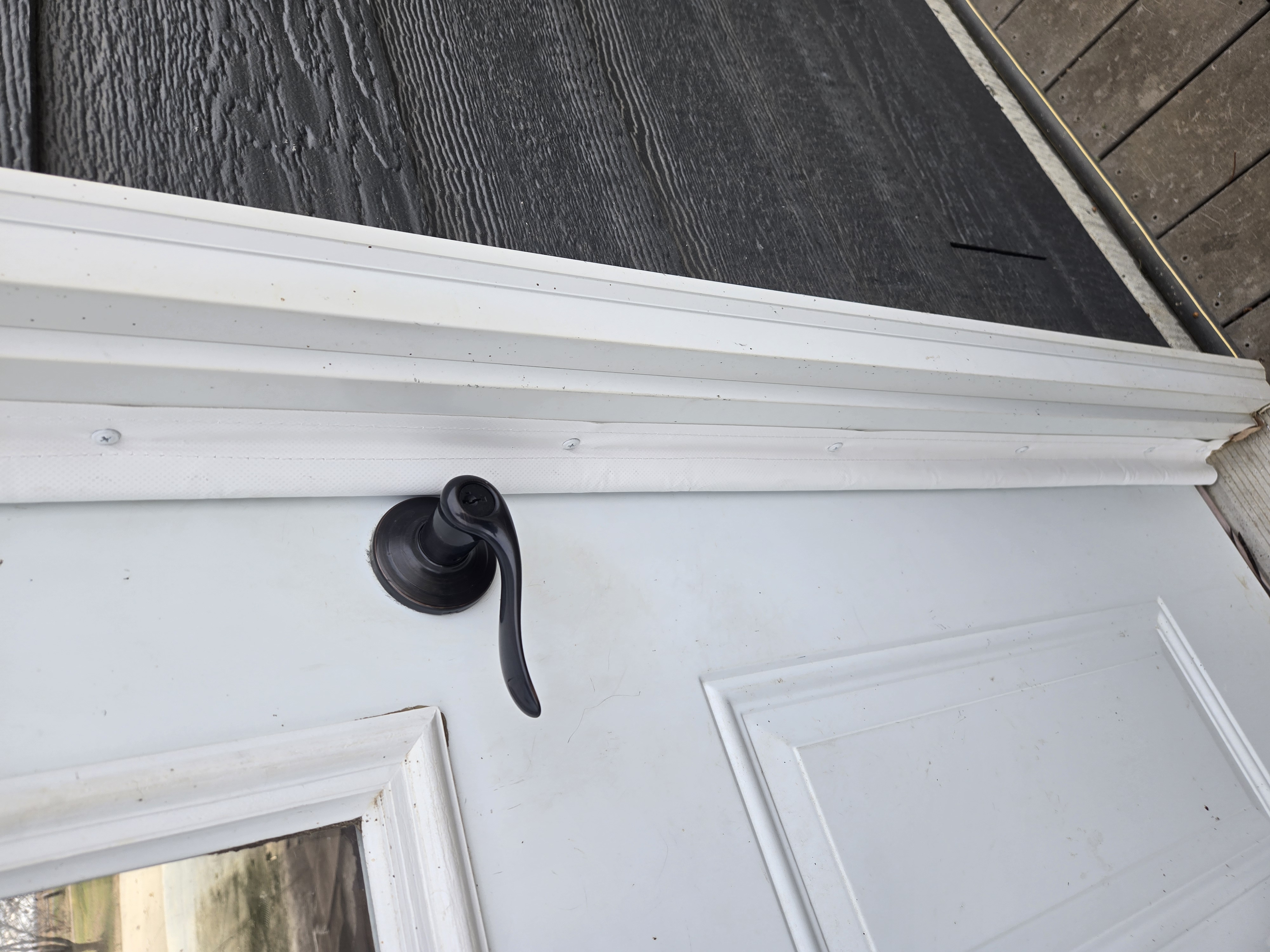 Door edge seal showing closing edge of door from outside